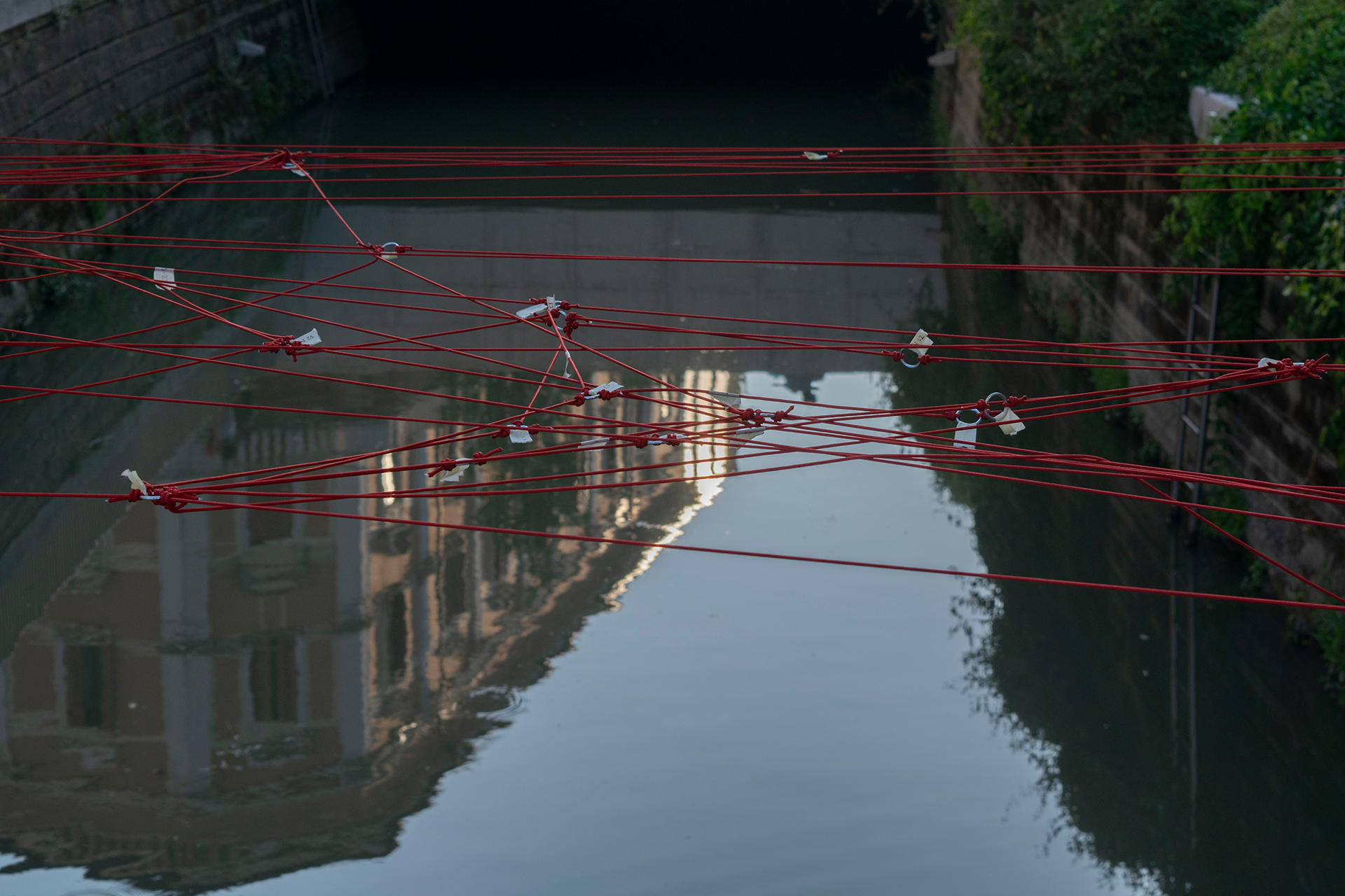 tensioned rope network over the canal